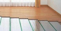 别墅装修中地暖上铺木地板还是瓷砖？